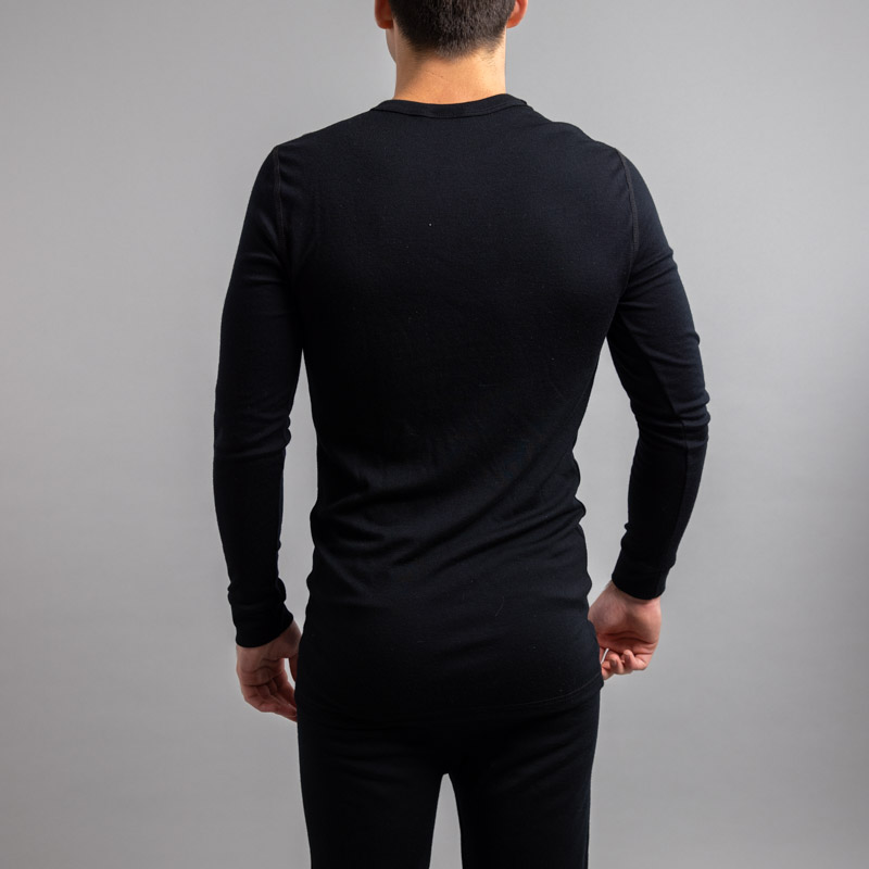Rearview of a male wearing black Merino Skins – Unisex Long Sleeve Crew Neck