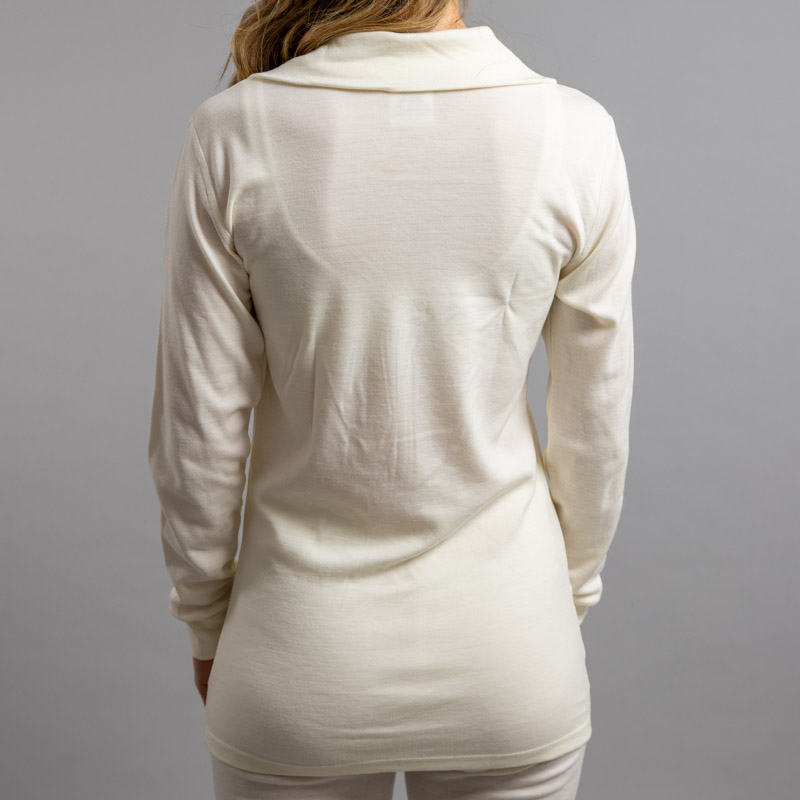Rearview of a female wearing white Merino Skins – Unisex Long Sleeve Half Zip Front