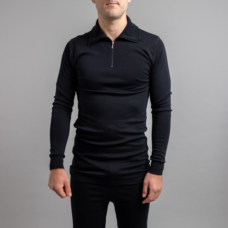 Front of a male wearing black Merino Skins – Unisex Long Sleeve Half Zip Front