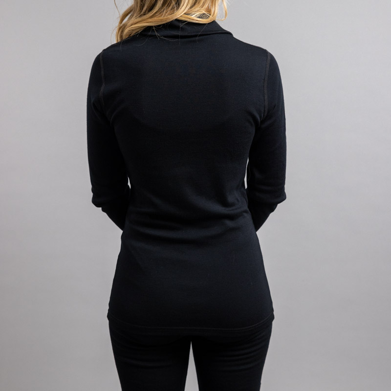 Rearview of a lady wearing black Merino Skins – Unisex Long Sleeve Half Zip Front