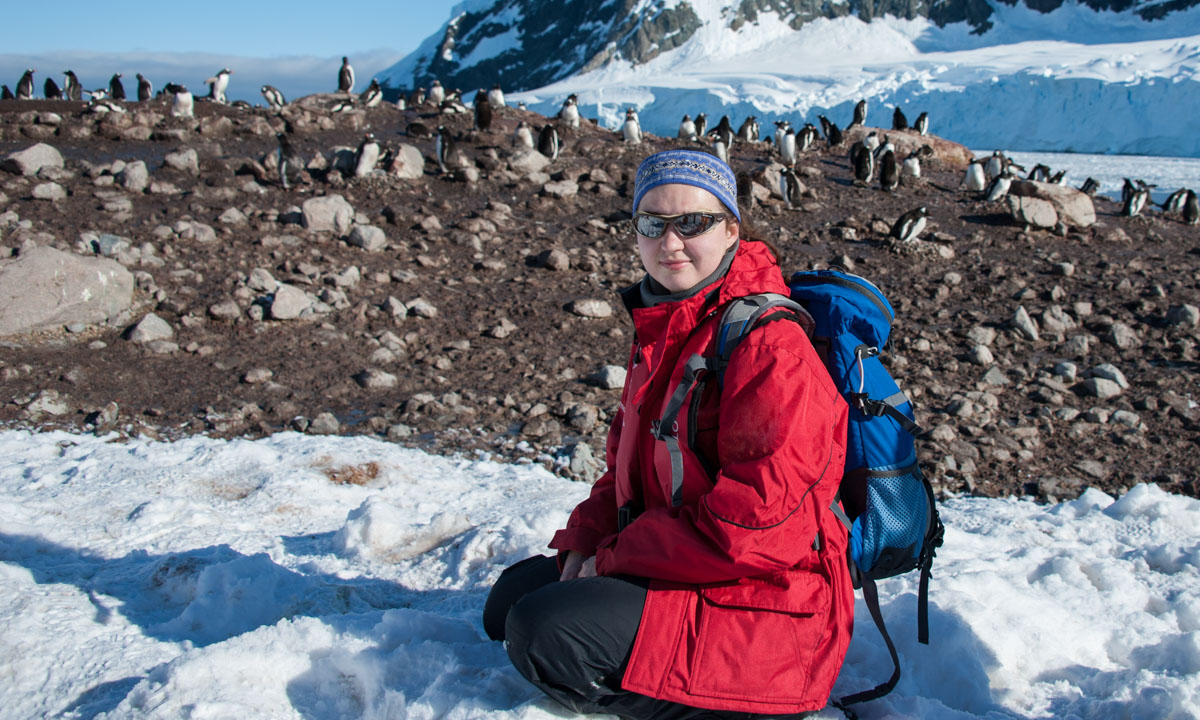 Lady wearing thermal wear and merino base layers on a trip to Antarctica