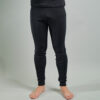 Front view of a male wearing black Merino Skins unisex long johns