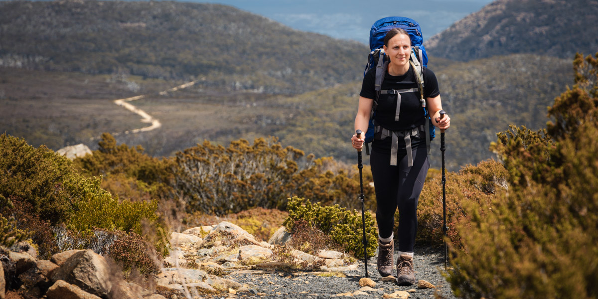 Lady wearing short sleeve Merino Skins t shirt while hiking in Tasmania