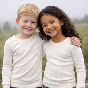 a boy and girl wearing Ktena unisex long sleeve thermal tops
