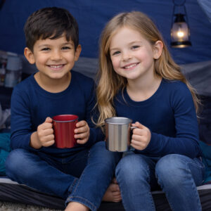 a boy and girl wearing navy Ktena MS Lite merino long sleeve tops